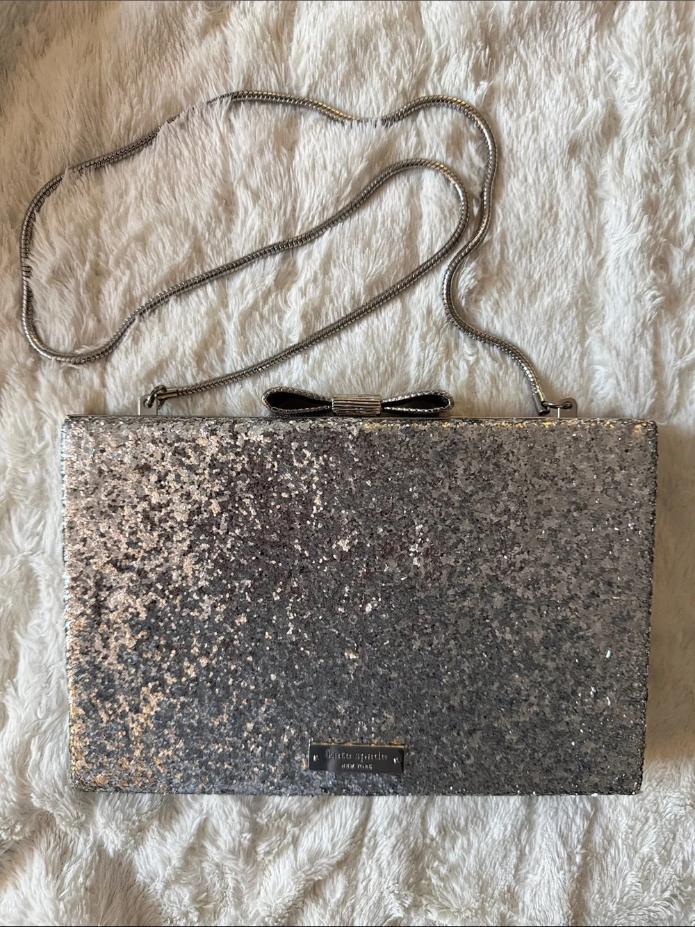 KATE SPADE Emanuelle Evening Belles PXRU4812 Silver Glitter Bow Crossbody Clutch